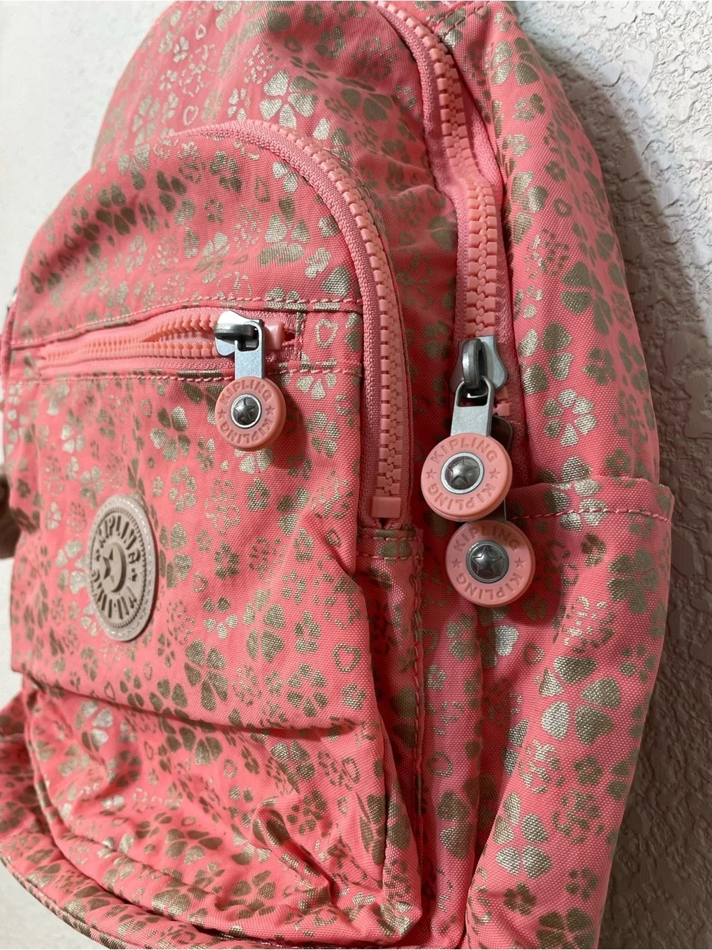 Kipling Pink Backpack with Gold Floral Print
